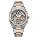 Luxury watch with silver and rose gold band on white background