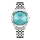A silver stainless steel women's watch with a blue dial and Roman numerals, from the brand Claudia Koch.