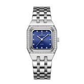 A silver blue luxury women's watch with a square dial and a metallic bracelet. The watch has a sleek, polished finish with a contemporary design.