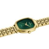 Gold watch with green face on a white background